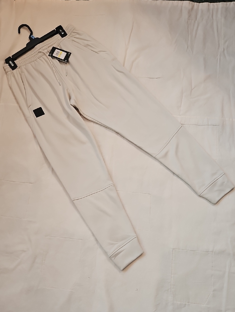 Under Armour Storm Men's Jogger Sweatpants in Cream with Black Patch Size M